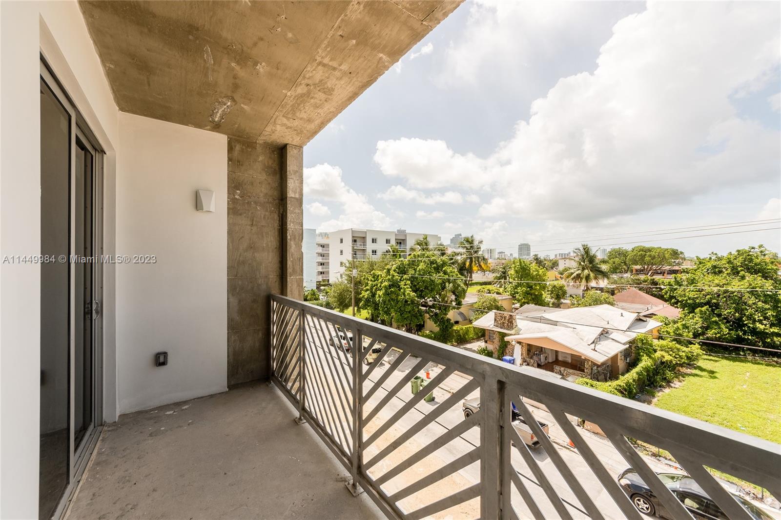 771 Northwest 1st Street, Unit 201 Miami, FL 33128 - Photo 15 of 34 a view of a balcony with city view