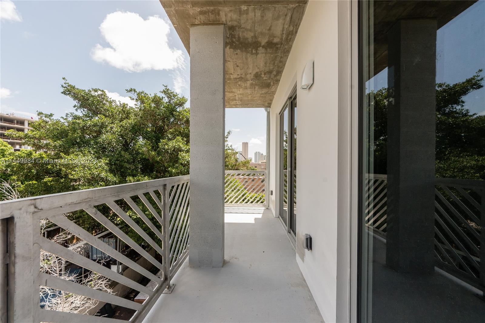 771 Northwest 1st Street, Unit 201 Miami, FL 33128 - Photo 17 of 34 a view of a balcony