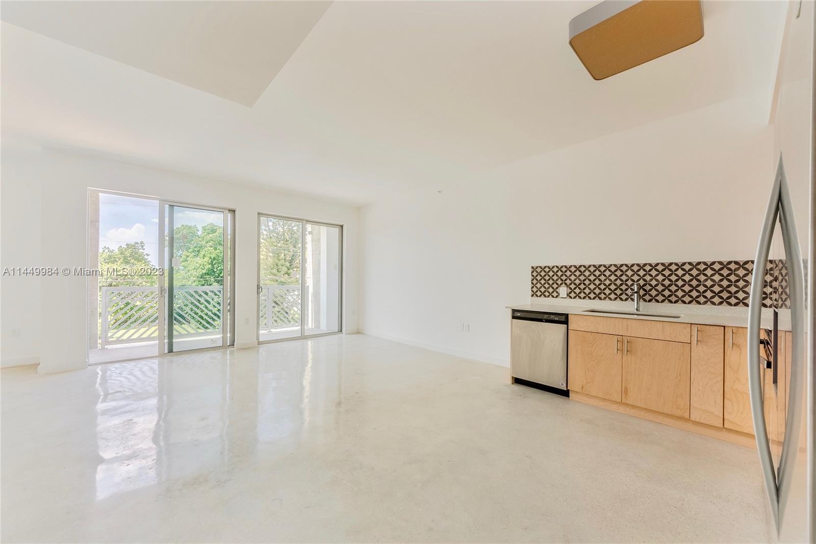 771 Northwest 1st Street, Unit 201 Miami, FL 33128 - Photo 28 of 34 a view of kitchen and sink