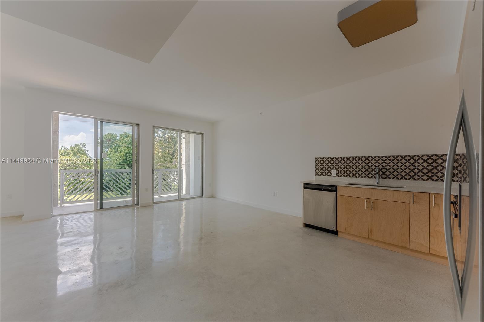 771 Northwest 1st Street, Unit 201 Miami, FL 33128 - Photo 29 of 34 a view of utility room and window