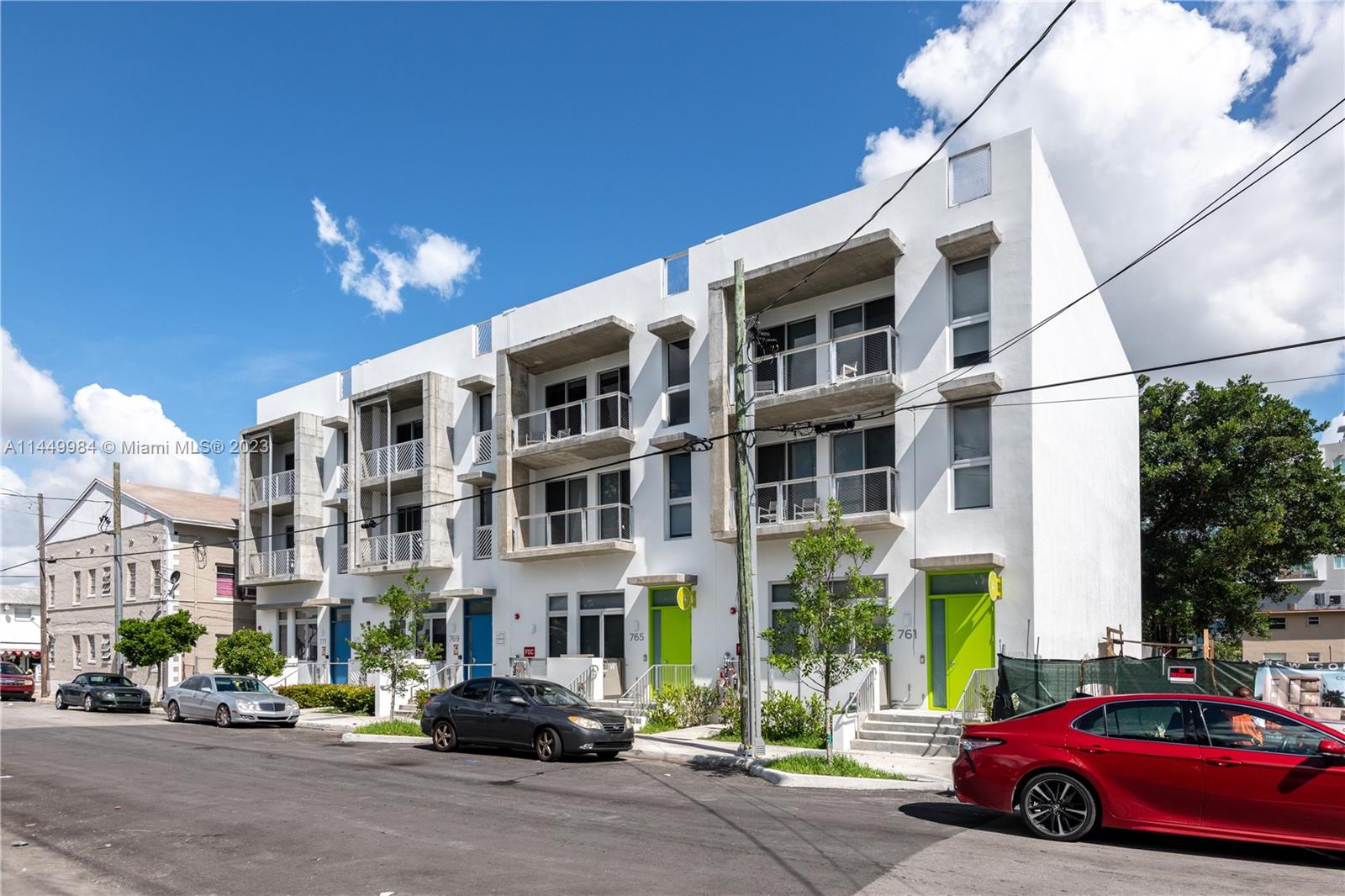 771 Northwest 1st Street, Unit 201 Miami, FL 33128 - Photo 3 of 34 a car parked in front of a building