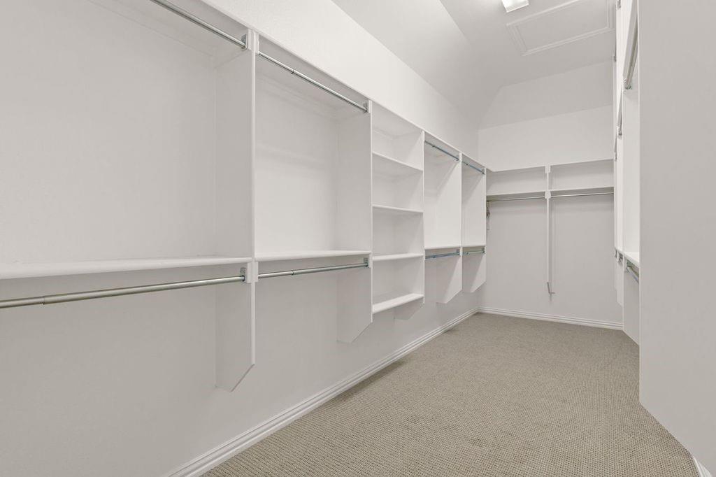 1636 Hydrangea Lane Prosper, TX 75078 - Photo 27 of 31 a view of an empty walk in closet