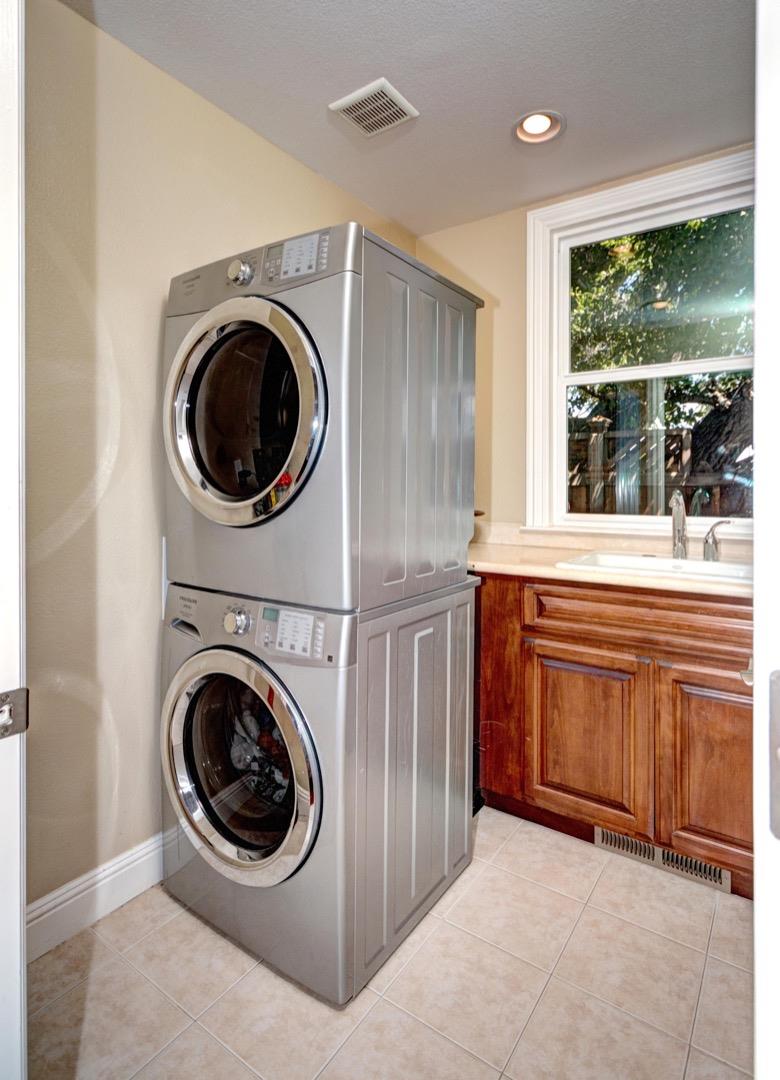 5408 Taft Drive San Jose, CA 95124 - Photo 16 of 26 a utility room with sink dryer and washer