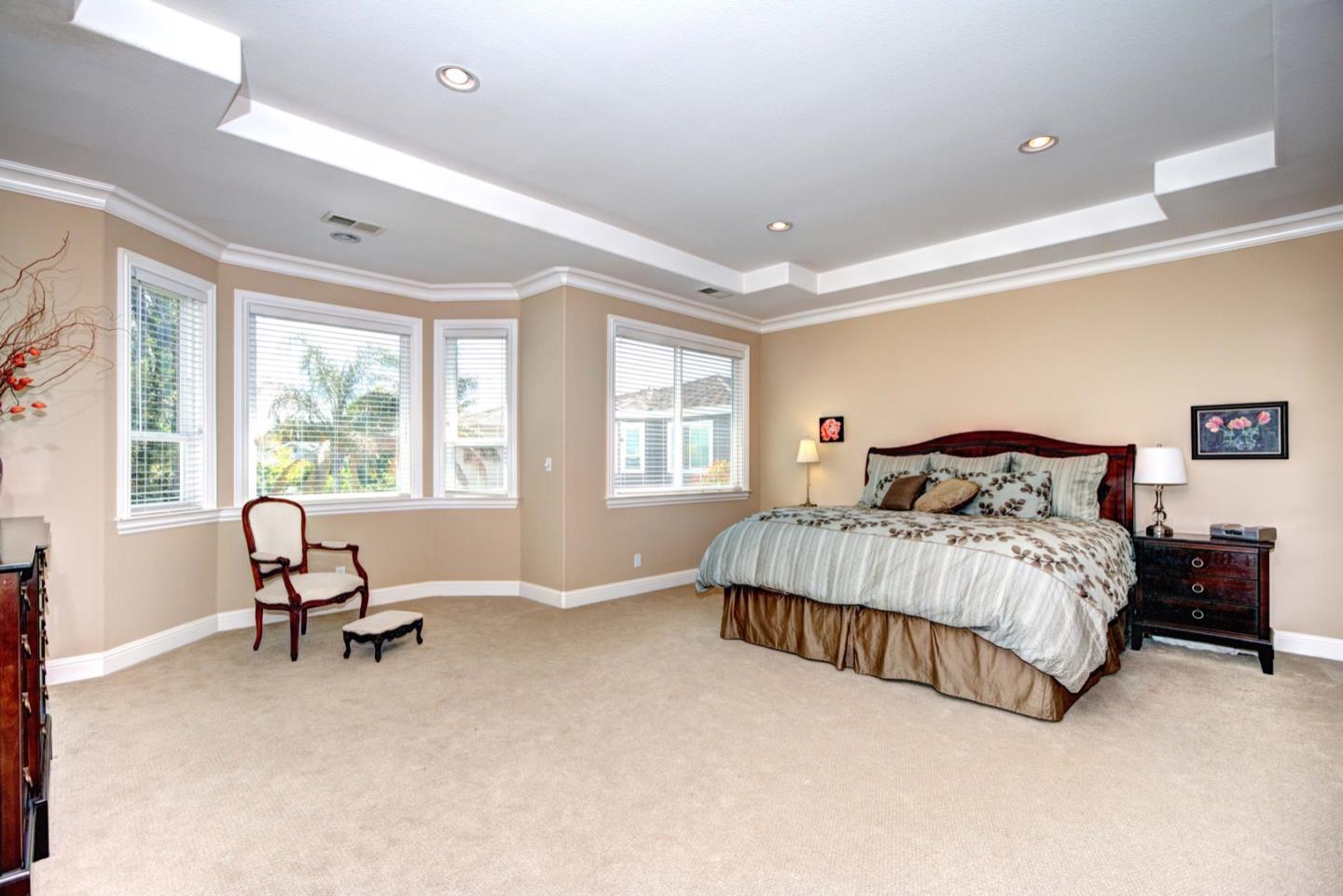 5408 Taft Drive San Jose, CA 95124 - Photo 20 of 26 a spacious bedroom with a bed and a window