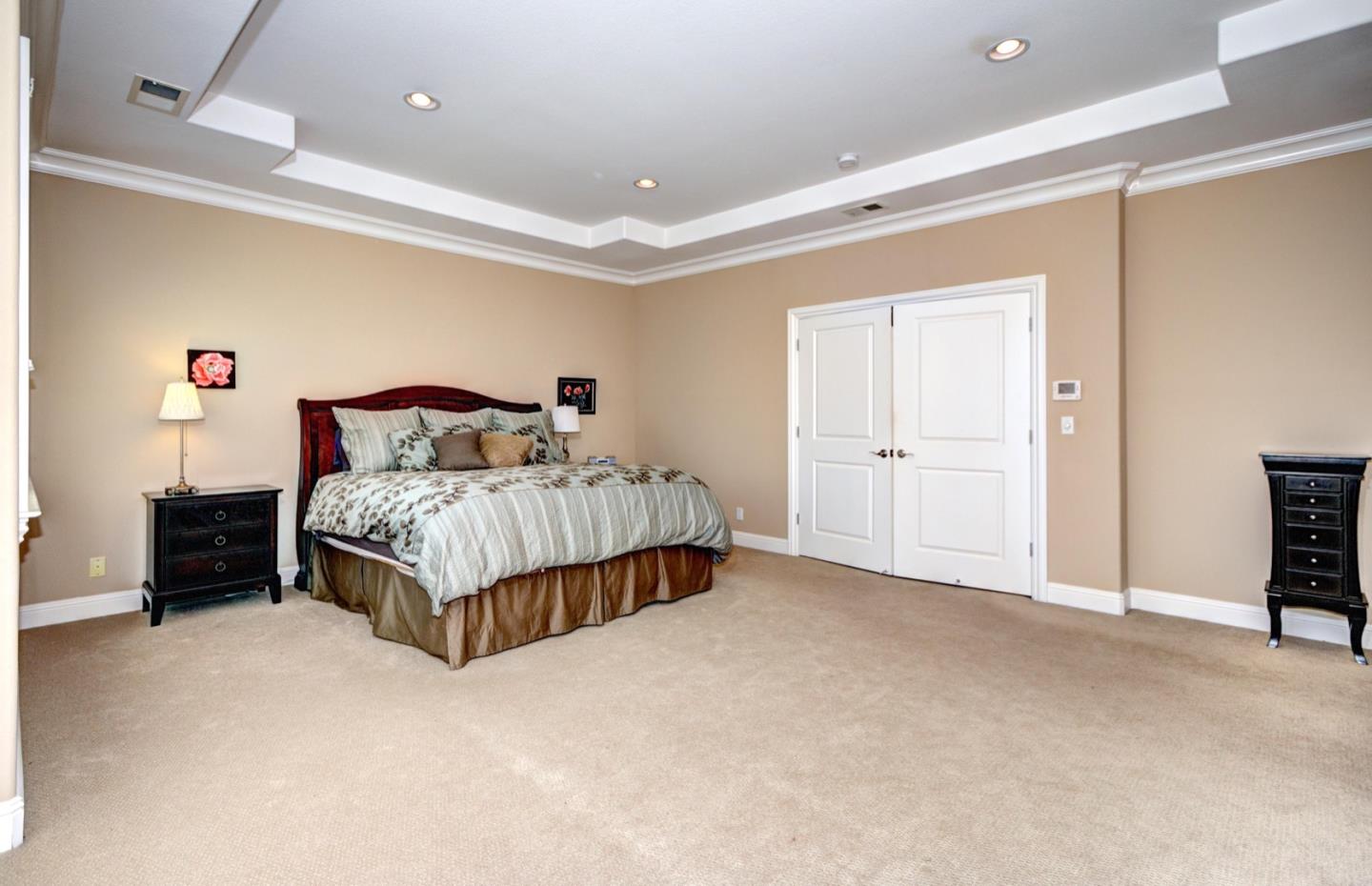 5408 Taft Drive San Jose, CA 95124 - Photo 21 of 26 a bedroom with a bed and a cabinets