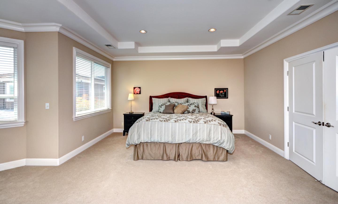 5408 Taft Drive San Jose, CA 95124 - Photo 22 of 26 a bedroom with a bed and a large window