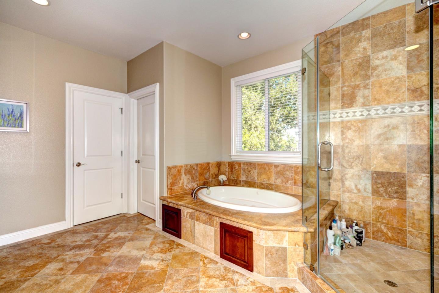 5408 Taft Drive San Jose, CA 95124 - Photo 24 of 26 a bathroom with a tub sink and mirror