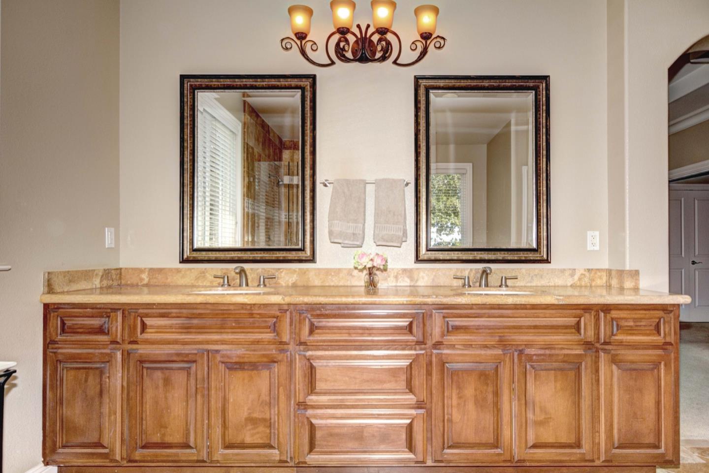 5408 Taft Drive San Jose, CA 95124 - Photo 25 of 26 a bathroom with a sink and a mirror