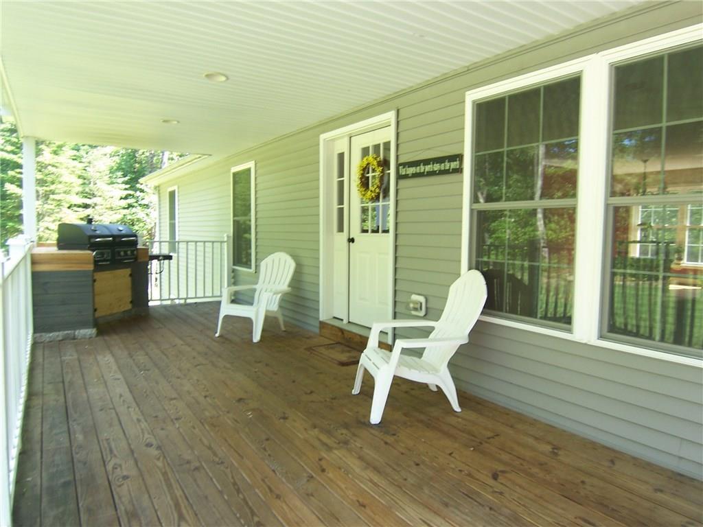 129 Powhatan Road Otisfield, ME 04270 - Photo 6 of 34 wonderful covered porch