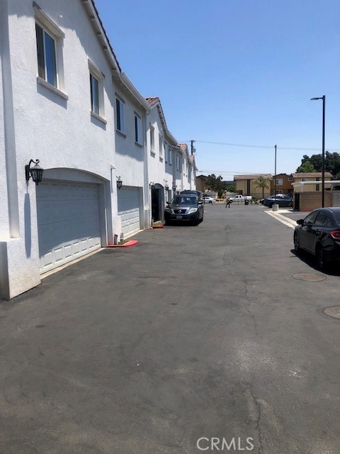 13665 Arrow Route, Unit 9 Fontana, CA 92335 - Photo 39 of 43 a view of a street with cars