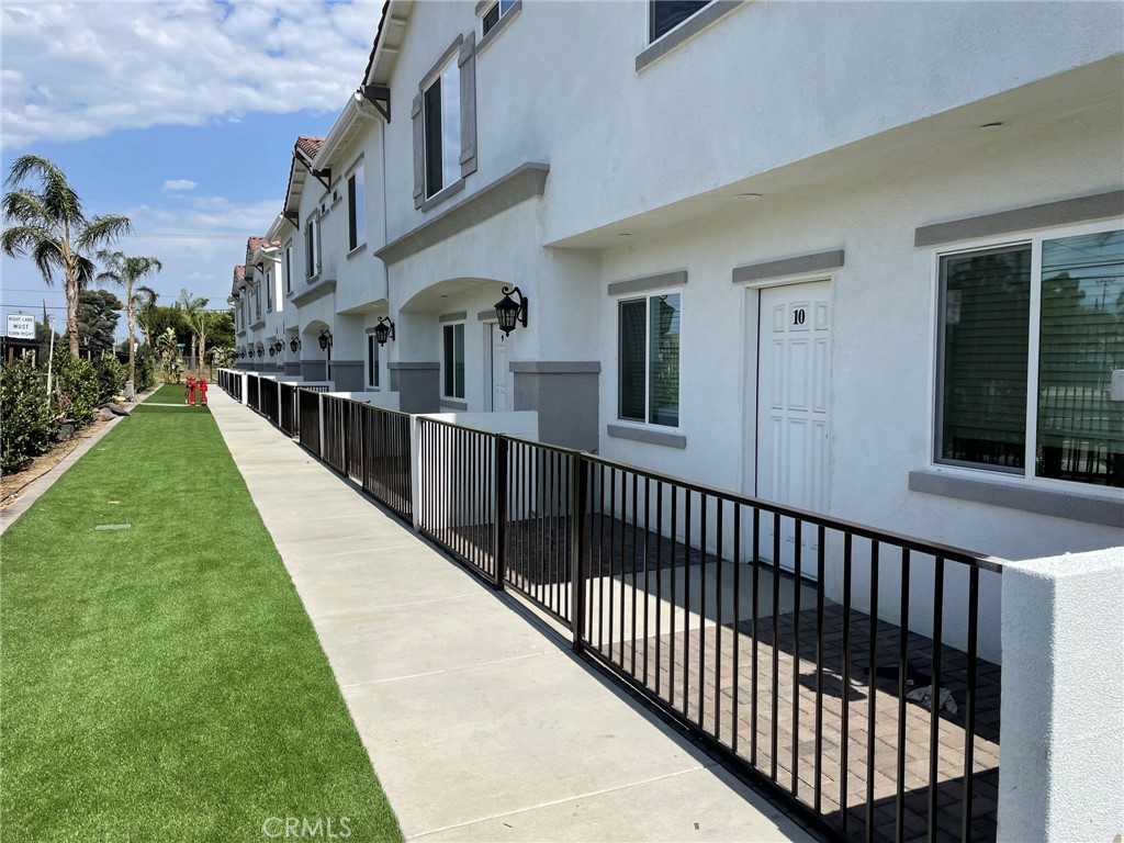 13665 Arrow Route, Unit 9 Fontana, CA 92335 - Photo 41 of 43 a view of a house with a balcony