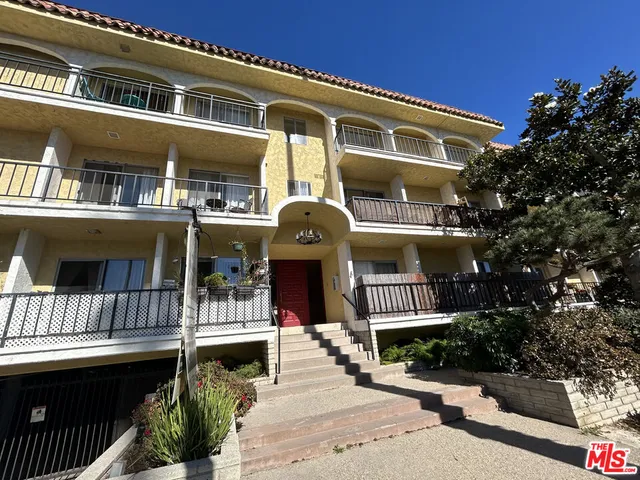 a front view of a house with a balcony