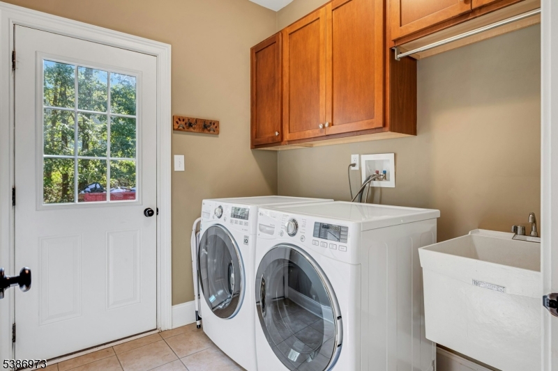 33 Chancellor Way Long Valley, NJ 07853 - Photo 21 of 42 a utility room with dryer and washer