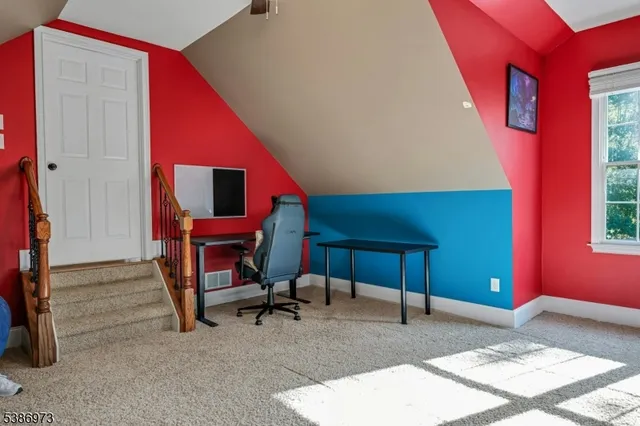 a view of livingroom with furniture and windows