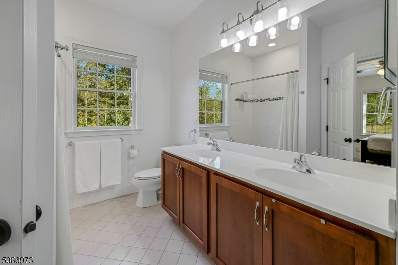 33 Chancellor Way Long Valley, NJ 07853 - Photo 26 of 42 a spacious bathroom with a double vanity sink mirror and a bathtub
