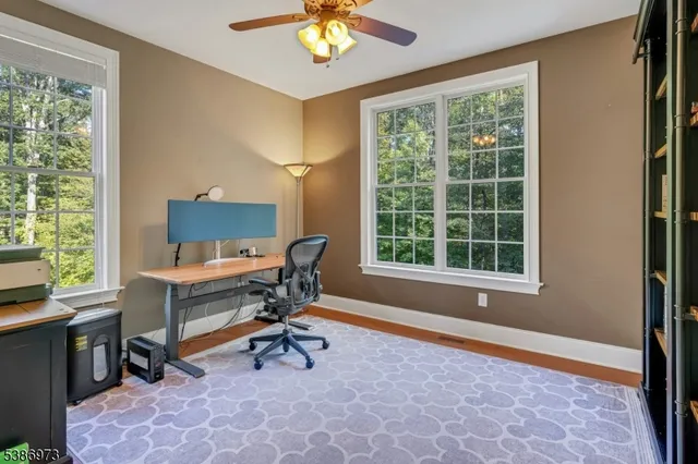 a area with wooden floor and a window