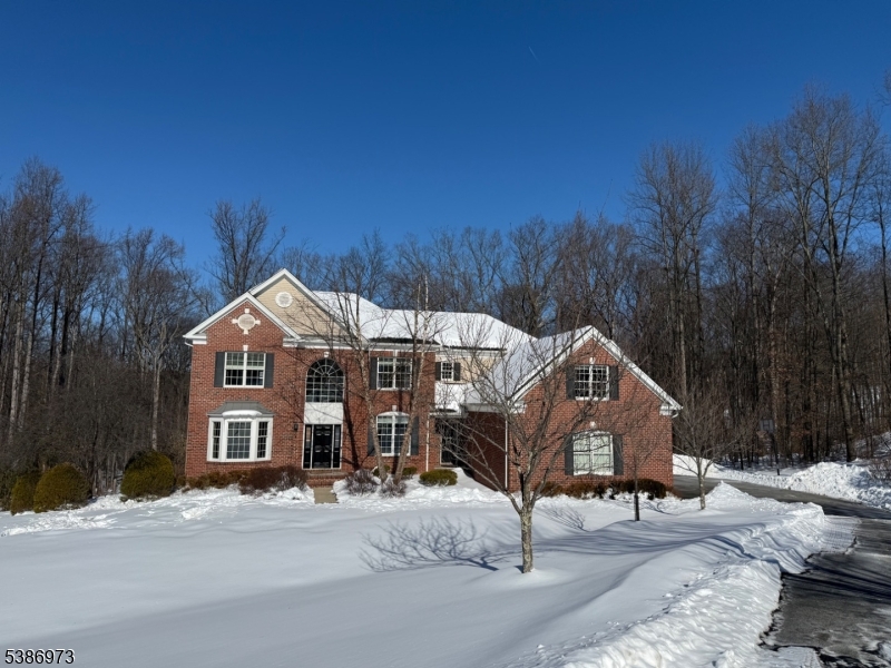 33 Chancellor Way Long Valley, NJ 07853 - Photo 35 of 42 a view of a big house with wooden fence