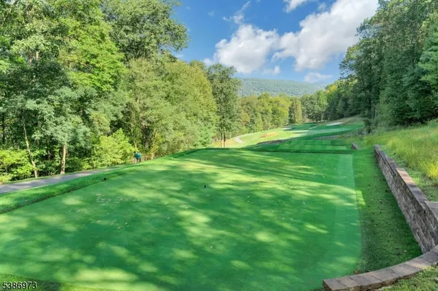 a roof deck with seating space