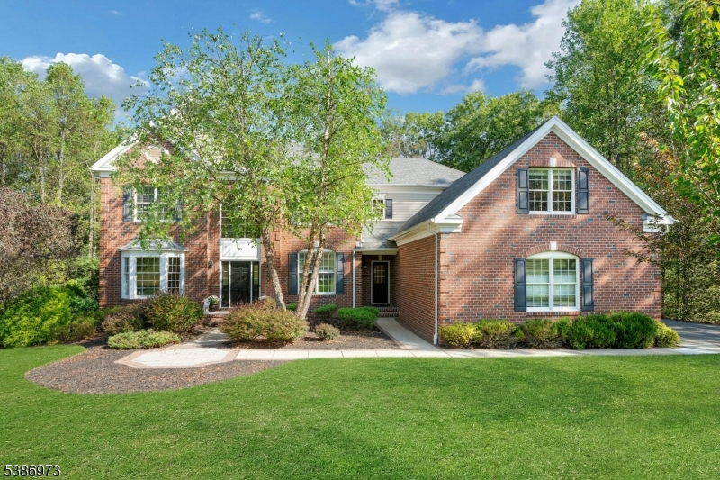 33 Chancellor Way Long Valley, NJ 07853 - Photo 40 of 42 a front view of house with yard and green space
