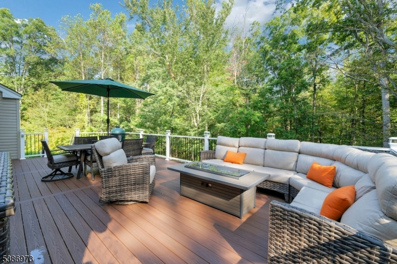 33 Chancellor Way Long Valley, NJ 07853 - Photo 42 of 42 an outdoor sitting area with furniture and wooden floor