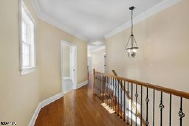 33 Chancellor Way Long Valley, NJ 07853 - Photo 9 of 42 a view of a hallway with a window