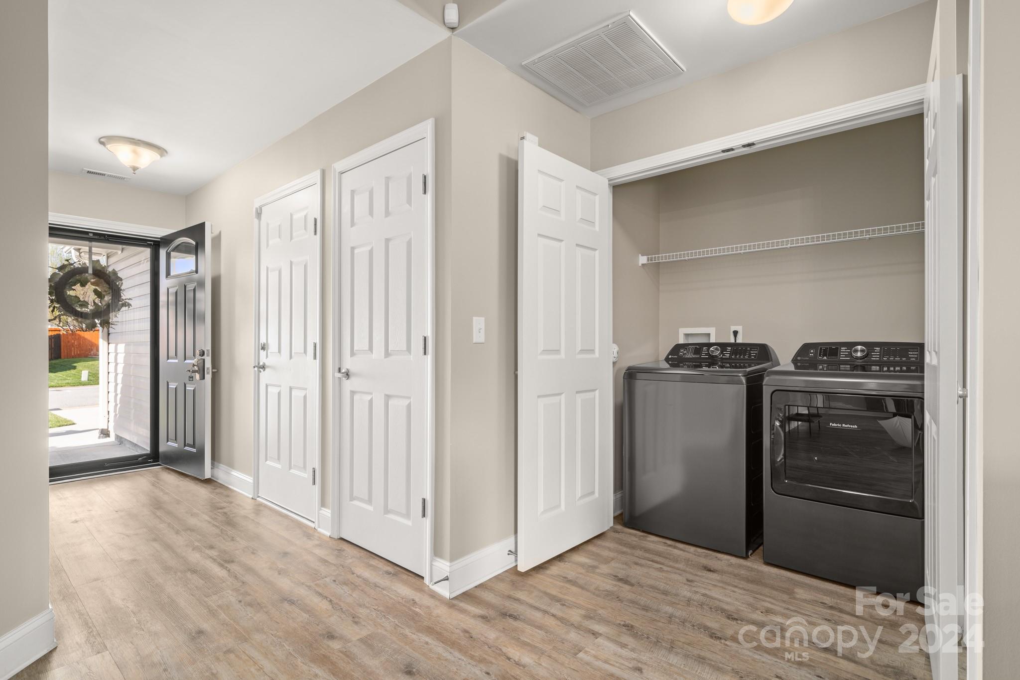 290 West Swift Creek Road Fletcher, NC 28732 - Photo 12 of 33 a kitchen with a refrigerator and a stove top oven