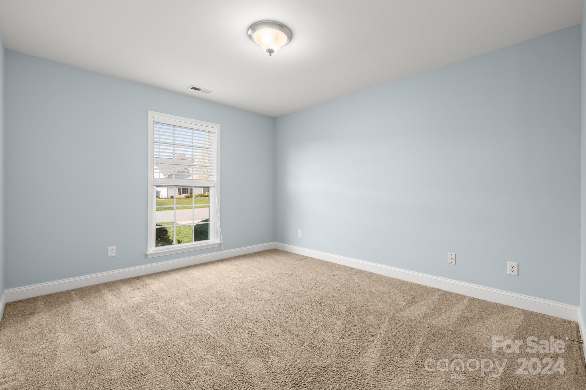 290 West Swift Creek Road Fletcher, NC 28732 - Photo 19 of 33 an empty room with windows