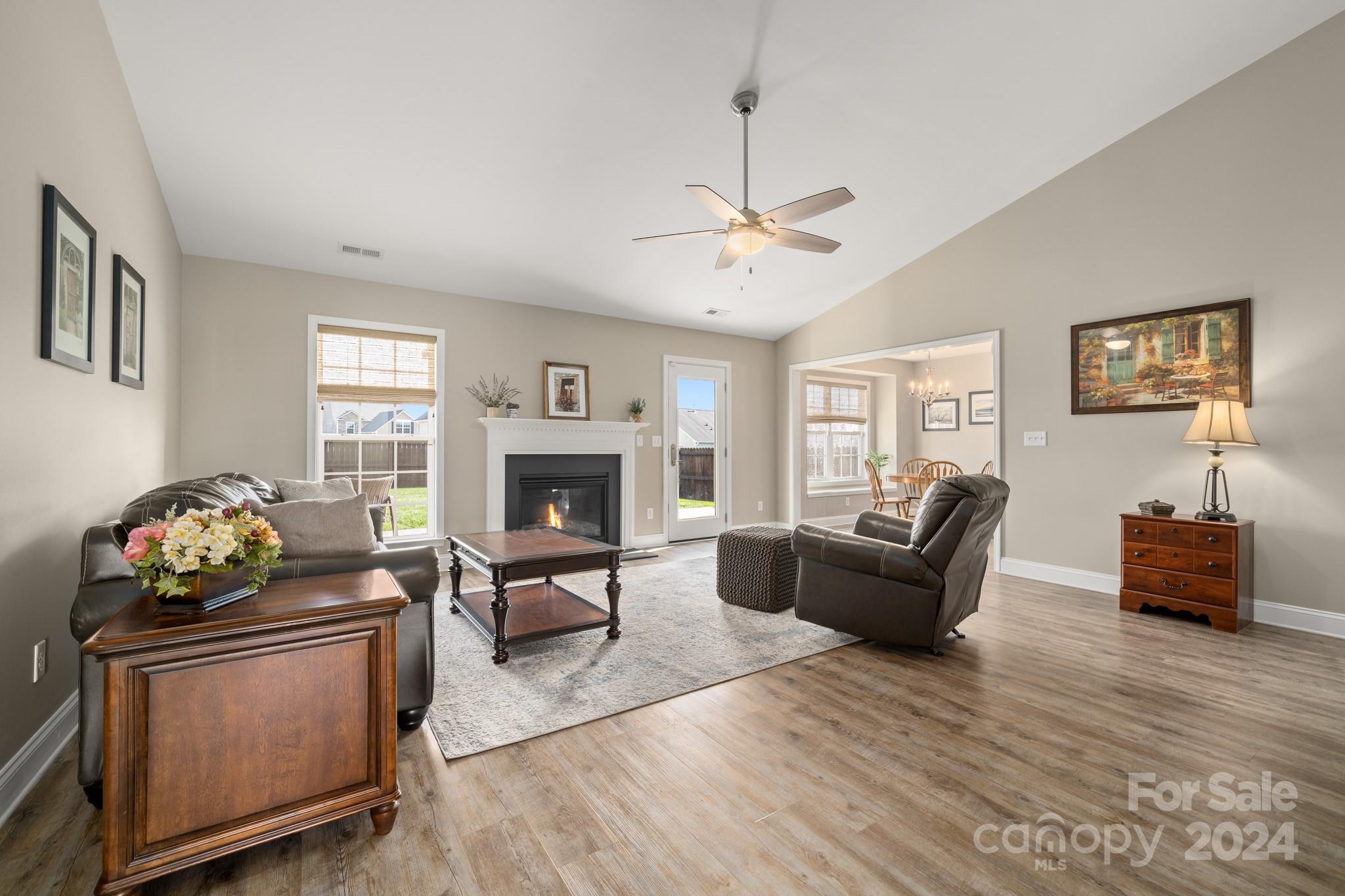 290 West Swift Creek Road Fletcher, NC 28732 - Photo 2 of 33 a living room with furniture and a fireplace