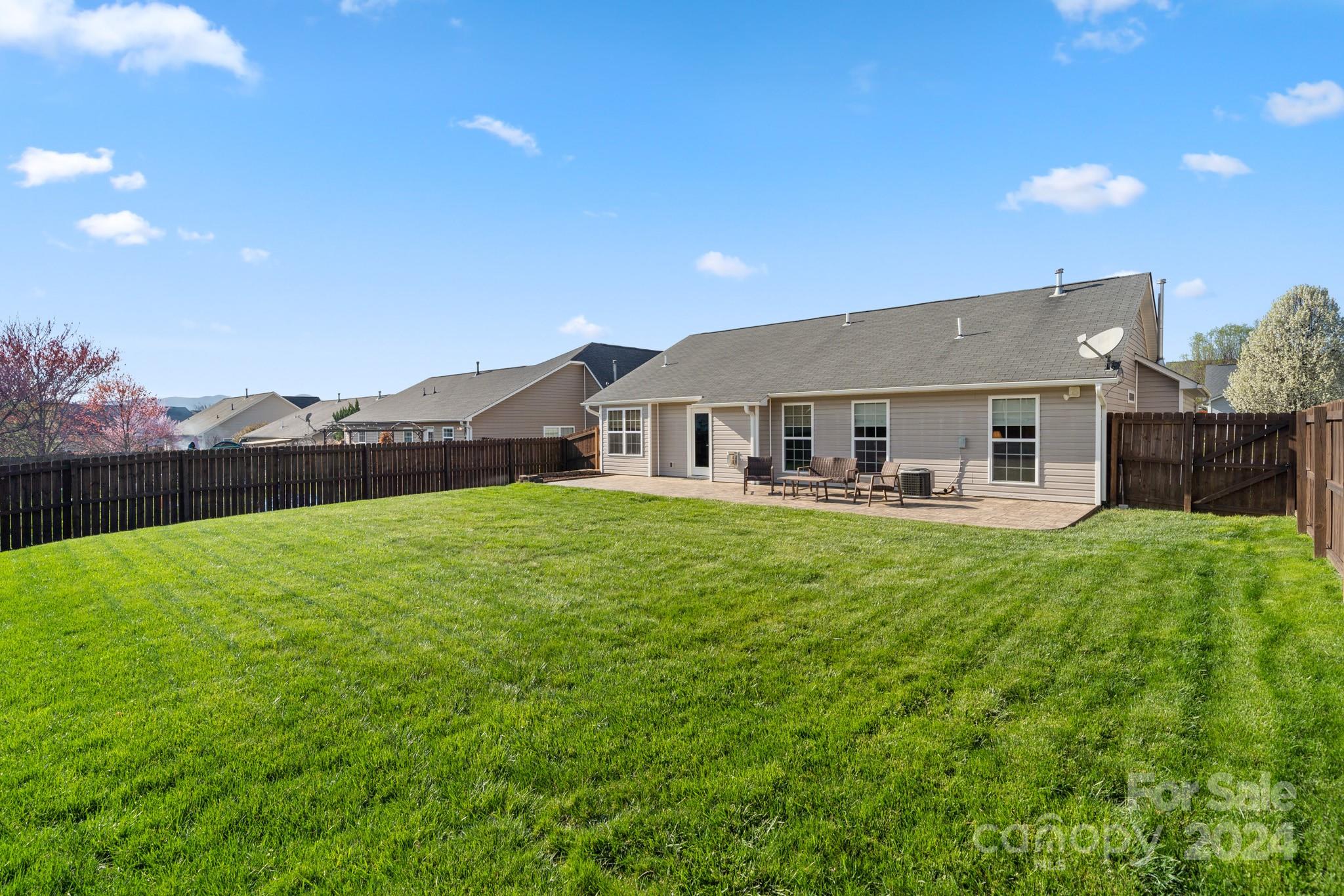 290 West Swift Creek Road Fletcher, NC 28732 - Photo 25 of 33 a front view of house with yard and green space