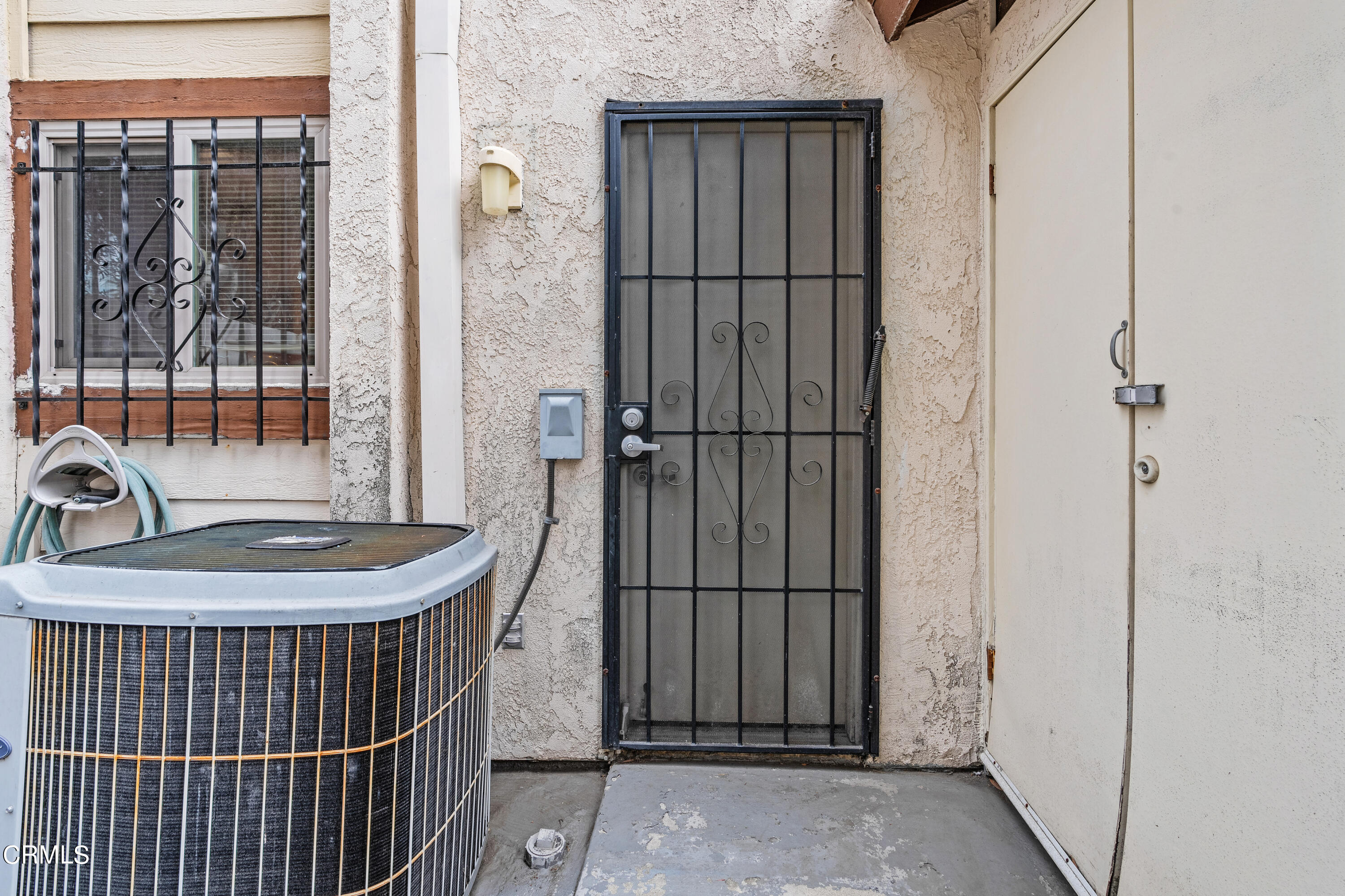 5170 North River Road, Unit C Oceanside, CA 92057 - Photo 34 of 43 a bathroom with a sink and mirror