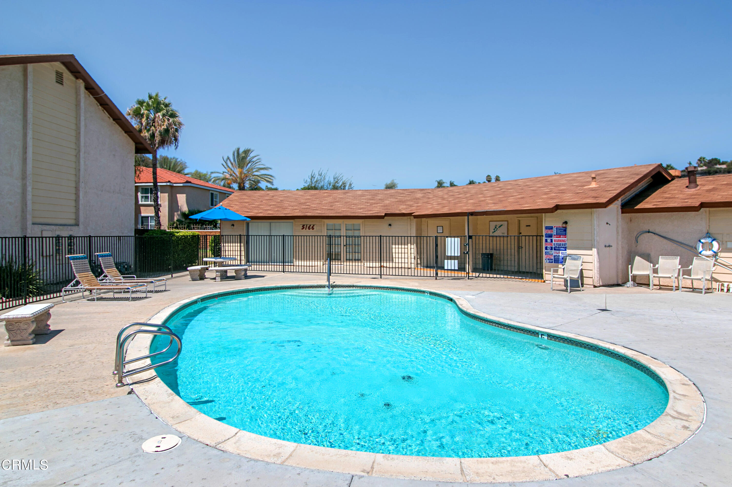 5170 North River Road, Unit C Oceanside, CA 92057 - Photo 38 of 43 an outdoor space with swimming pool and furniture