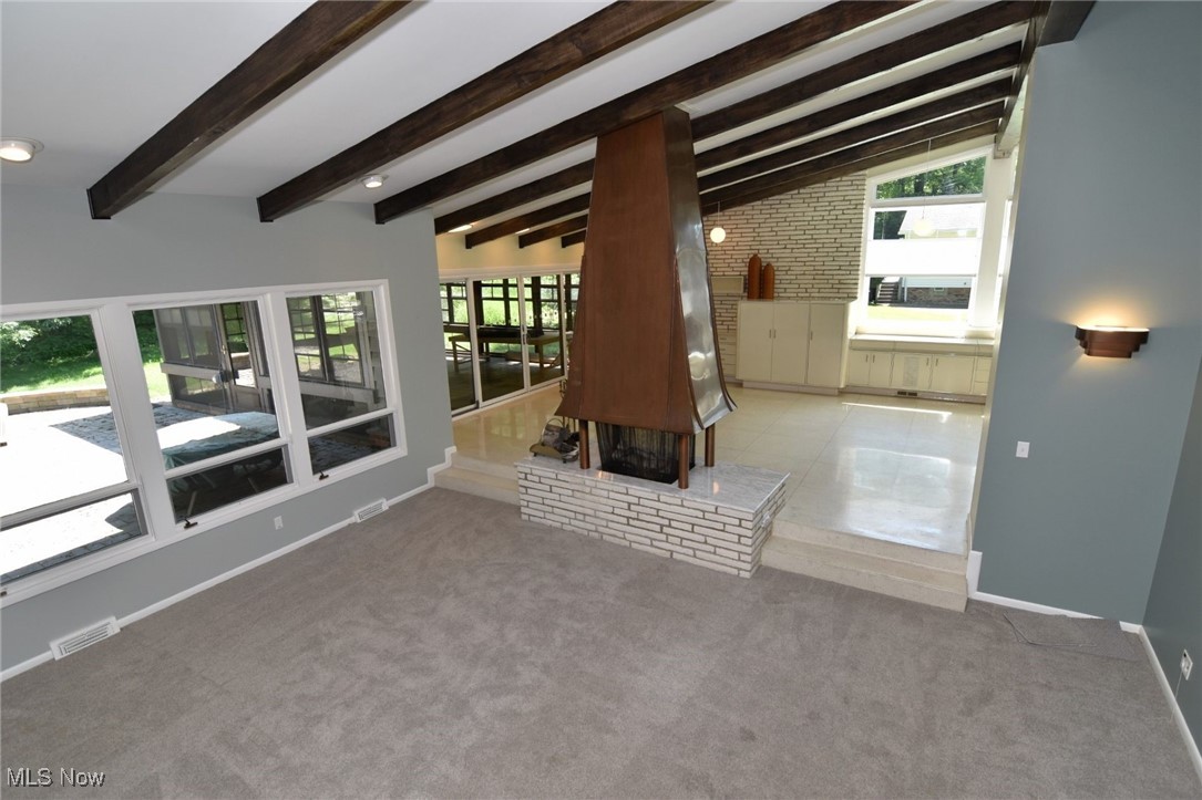 2793 Belgrave Road Cleveland, OH 44124 - Photo 14 of 40 Great room featuring fire place and beam ceilings