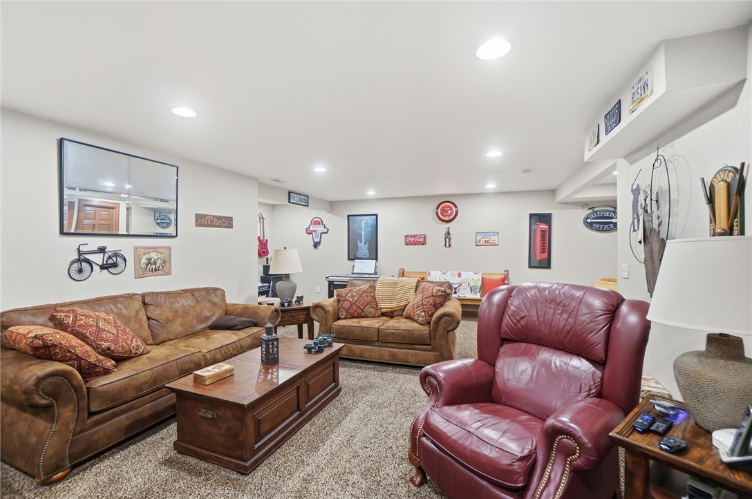 5300 Brookshire Lane Springfield, OH 45502 - Photo 48 of 56 This living room provides a comfortable and inviting atmosphere for relaxation and gatherings.