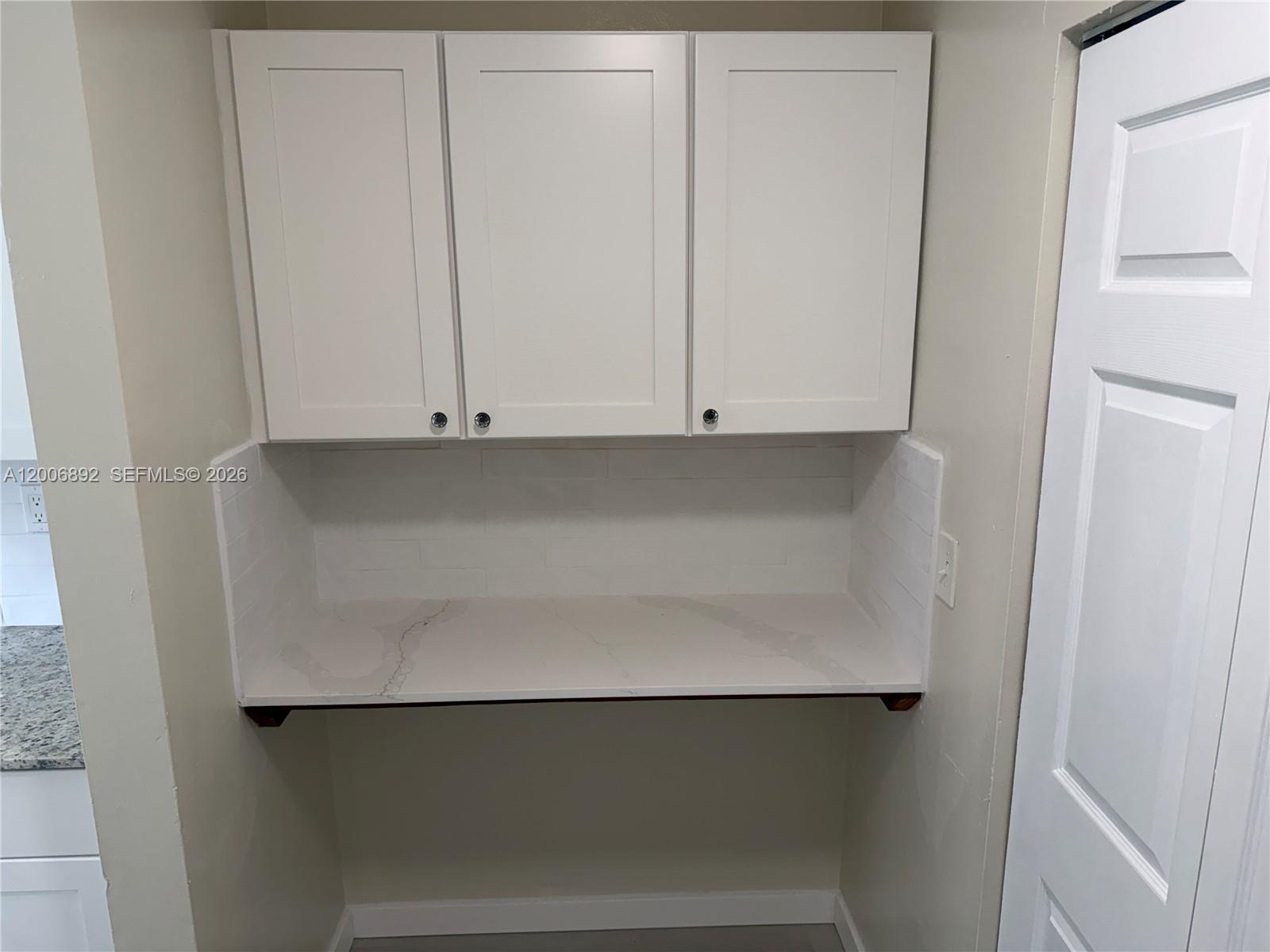 10375 Southwest 152nd Terrace Miami, FL 33157 - Photo 17 of 59 a view of cabinets