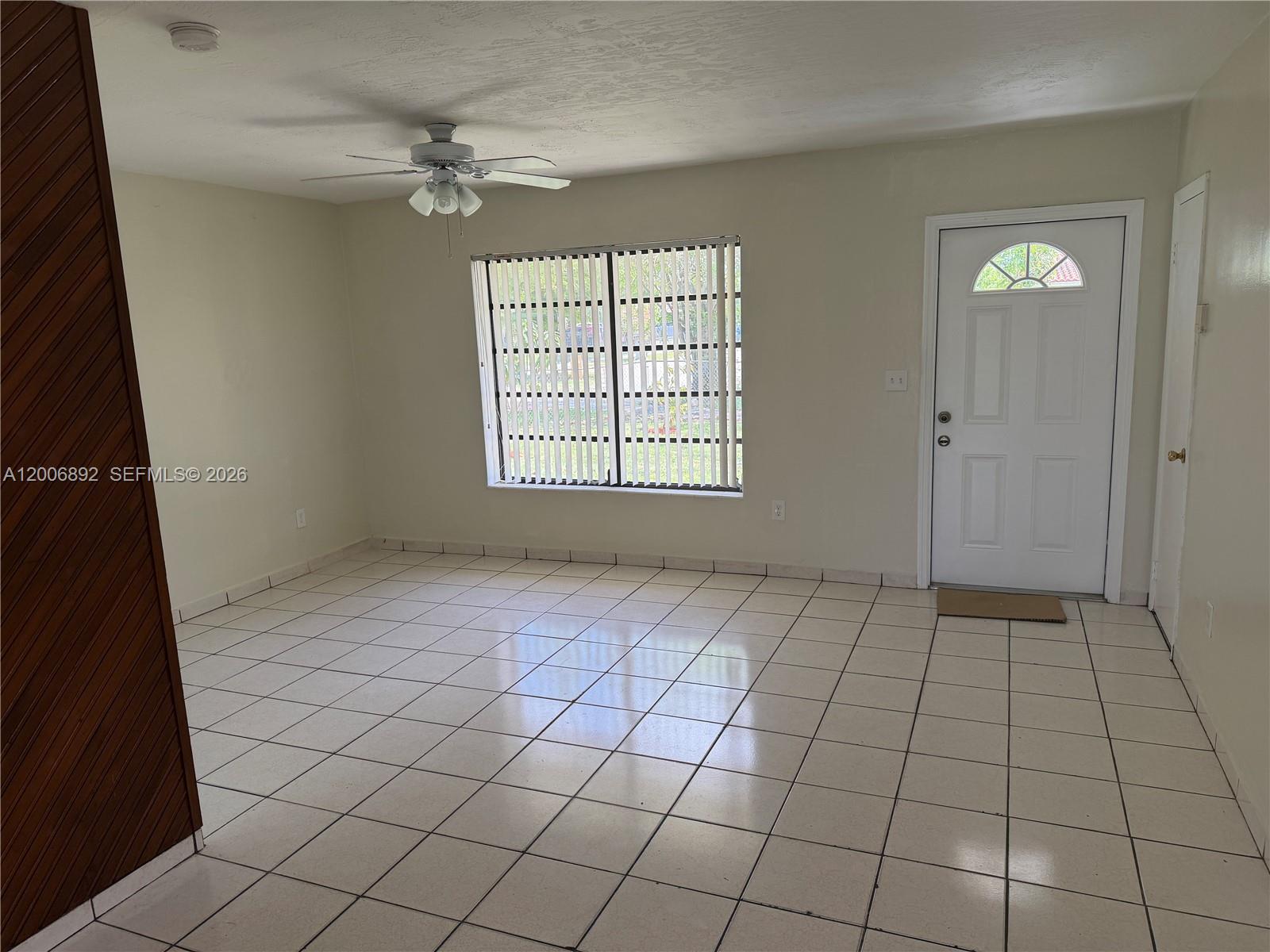 10375 Southwest 152nd Terrace Miami, FL 33157 - Photo 21 of 59 a view of an empty room and window