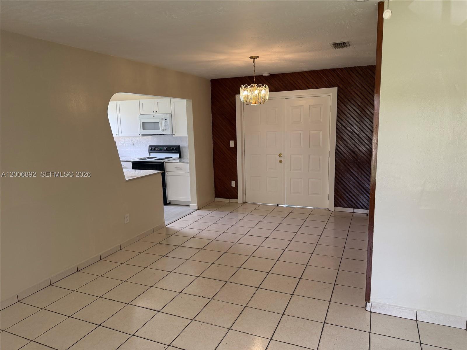 10375 Southwest 152nd Terrace Miami, FL 33157 - Photo 22 of 59 an empty room with windows