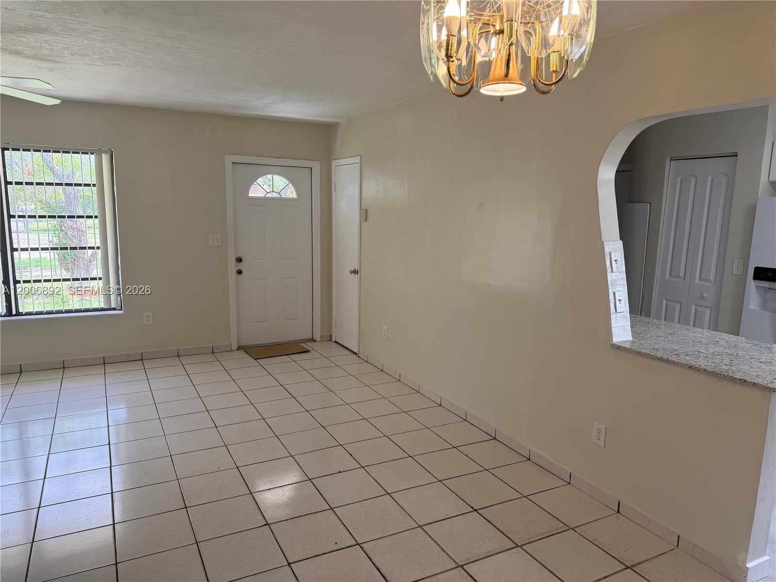 10375 Southwest 152nd Terrace Miami, FL 33157 - Photo 25 of 59 an empty room with windows