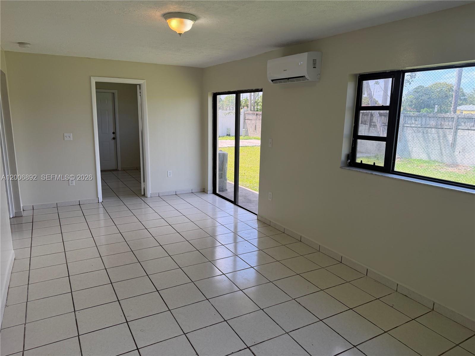 10375 Southwest 152nd Terrace Miami, FL 33157 - Photo 45 of 59 a view of an empty room and window