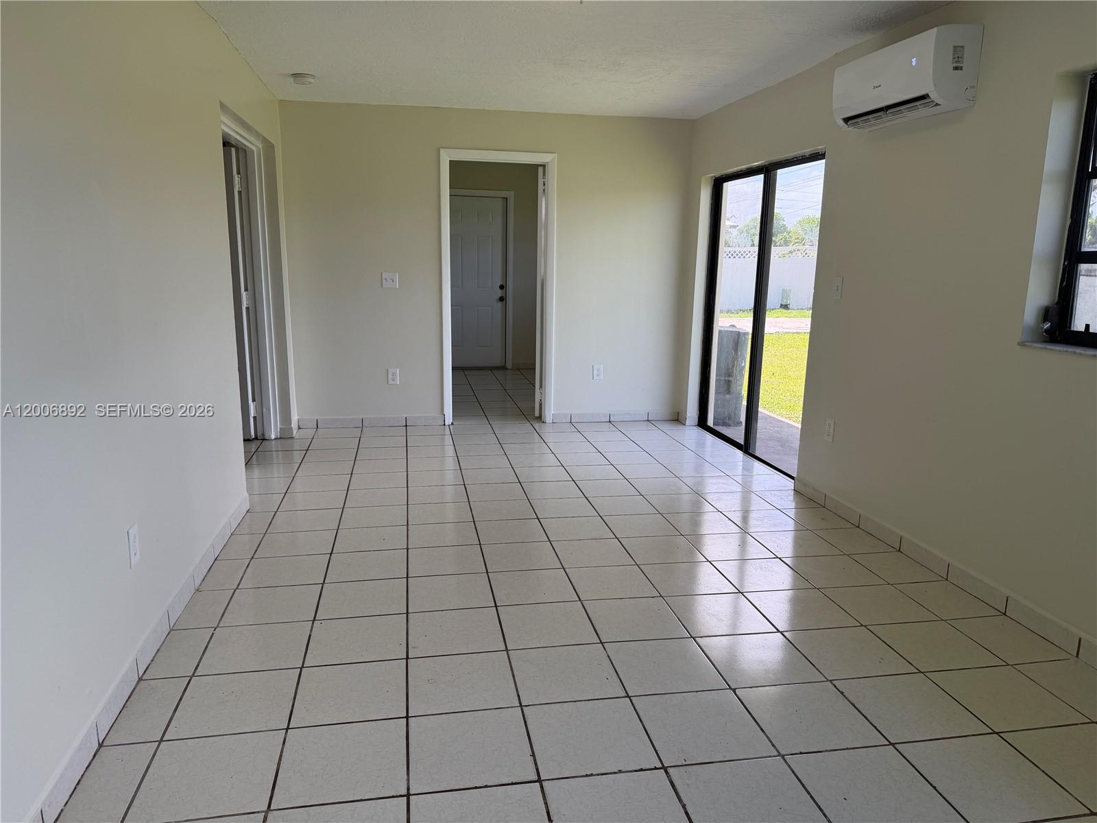 10375 Southwest 152nd Terrace Miami, FL 33157 - Photo 46 of 59 a view of an empty room and window