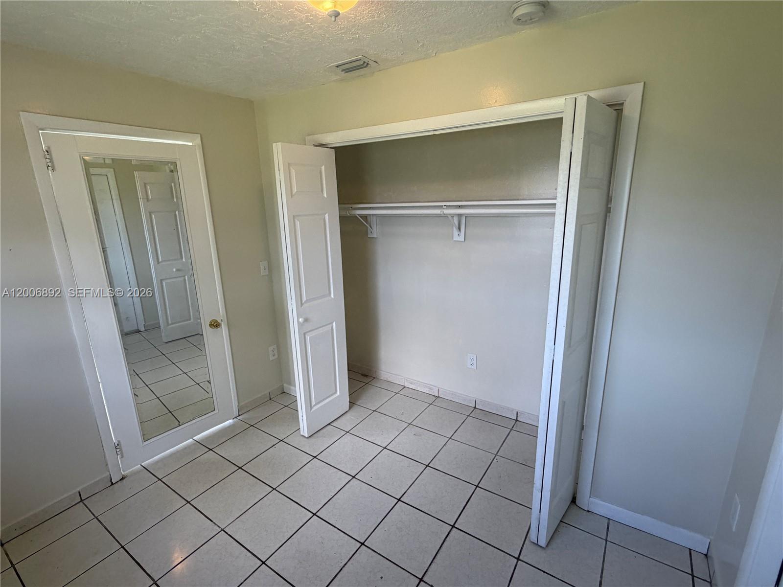 10375 Southwest 152nd Terrace Miami, FL 33157 - Photo 48 of 59 a view of an empty room