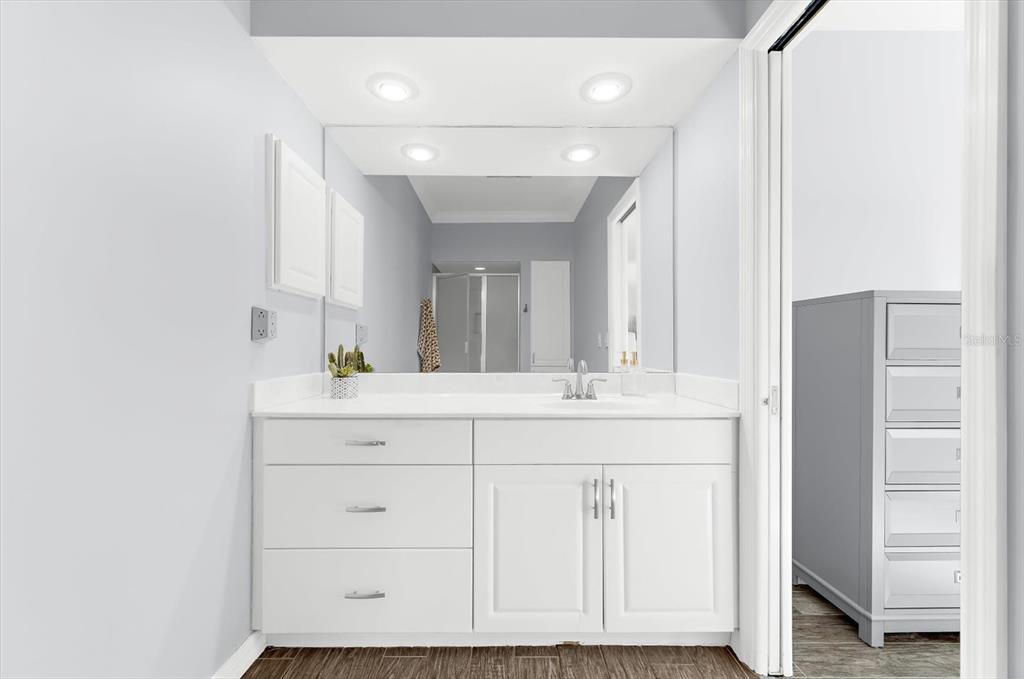 5 Barbados Road, Unit 31 Englewood, FL 34223 - Photo 20 of 40 a bathroom with a sink and a mirror