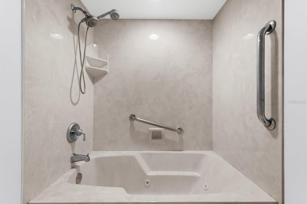 5 Barbados Road, Unit 31 Englewood, FL 34223 - Photo 25 of 40 a bathroom with a shower and a sink