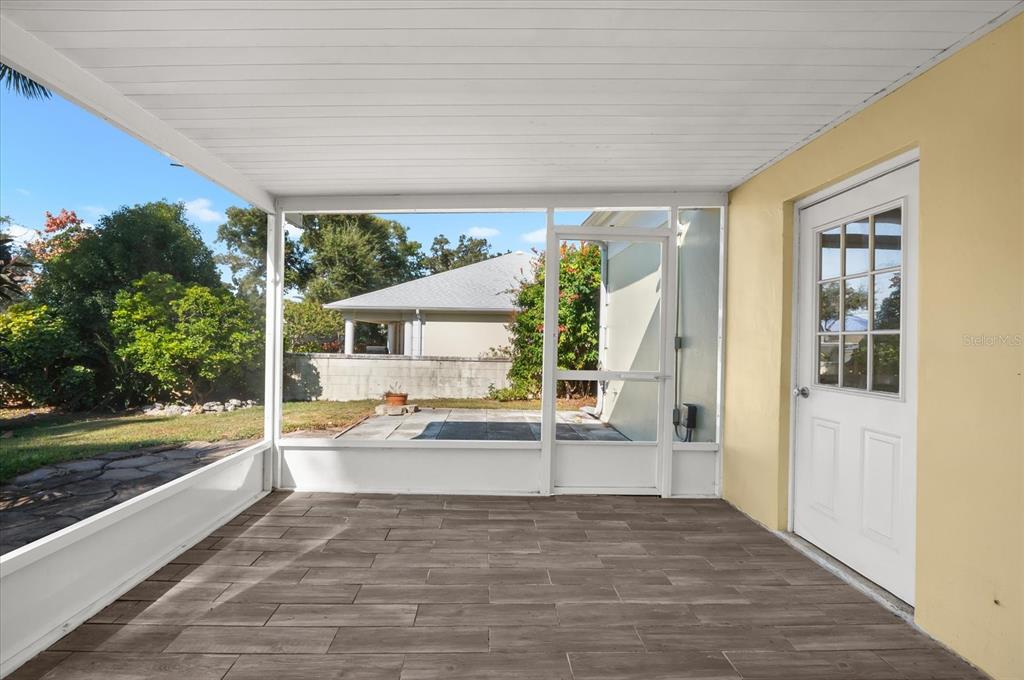 5 Barbados Road, Unit 31 Englewood, FL 34223 - Photo 27 of 40 a view of a house with backyard and porch
