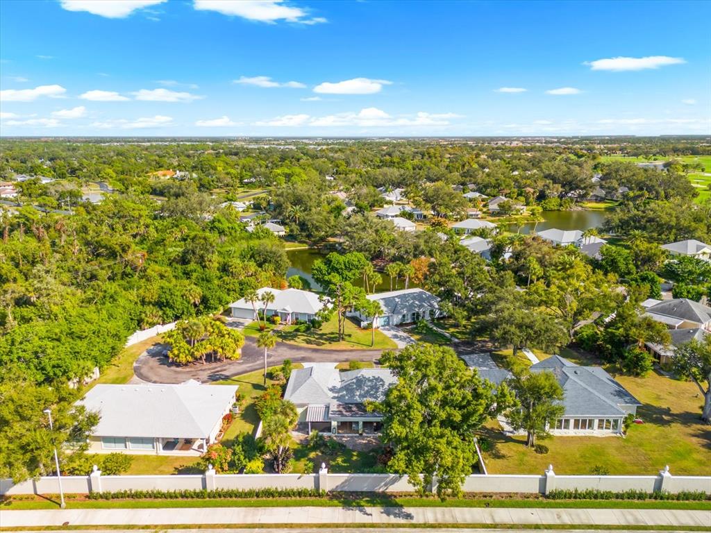 5 Barbados Road, Unit 31 Englewood, FL 34223 - Photo 30 of 40 an aerial view of residential houses with outdoor space