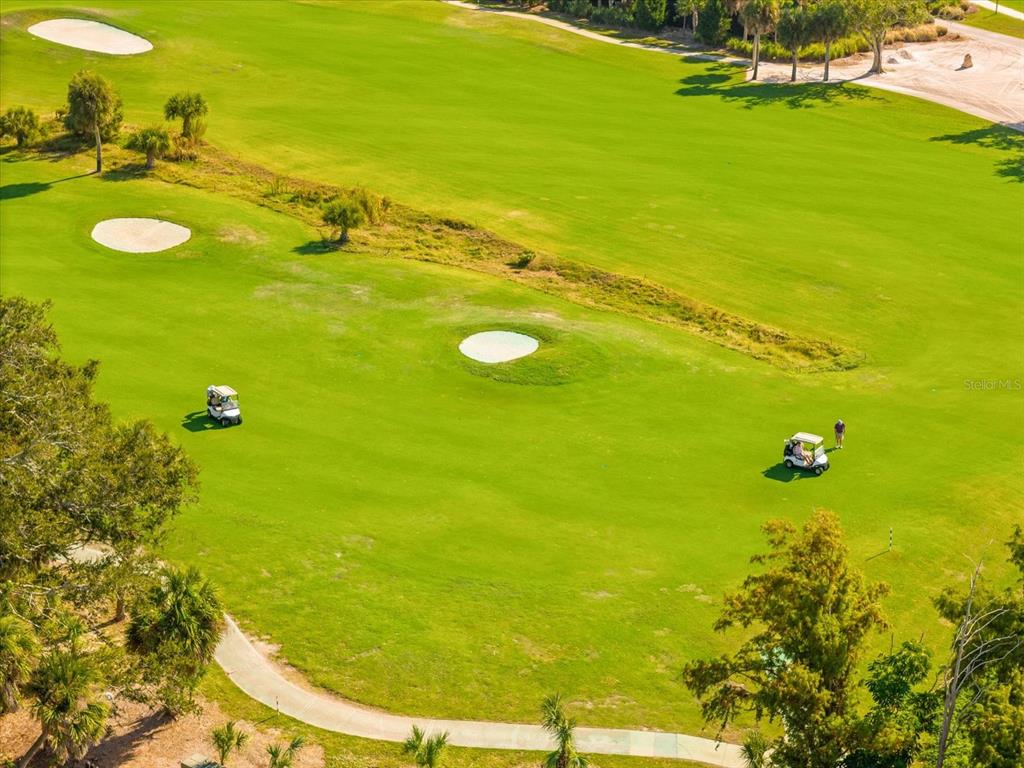 5 Barbados Road, Unit 31 Englewood, FL 34223 - Photo 35 of 40 a view of an ocean beach and outdoor seating
