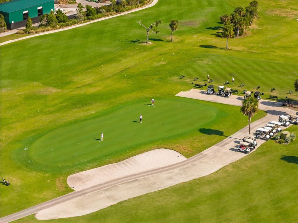 5 Barbados Road, Unit 31 Englewood, FL 34223 - Photo 36 of 40 a view of a golf course with an ocean
