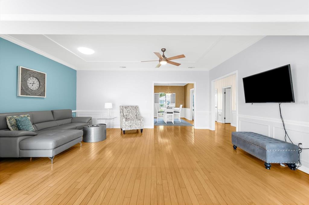 5 Barbados Road, Unit 31 Englewood, FL 34223 - Photo 9 of 40 a living room with furniture and a flat screen tv