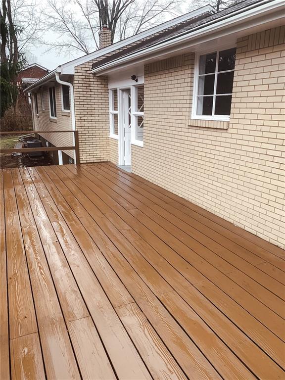 604 New Texas Road Pittsburgh, PA 15239 - Photo 16 of 18 a backyard of a house with seating space