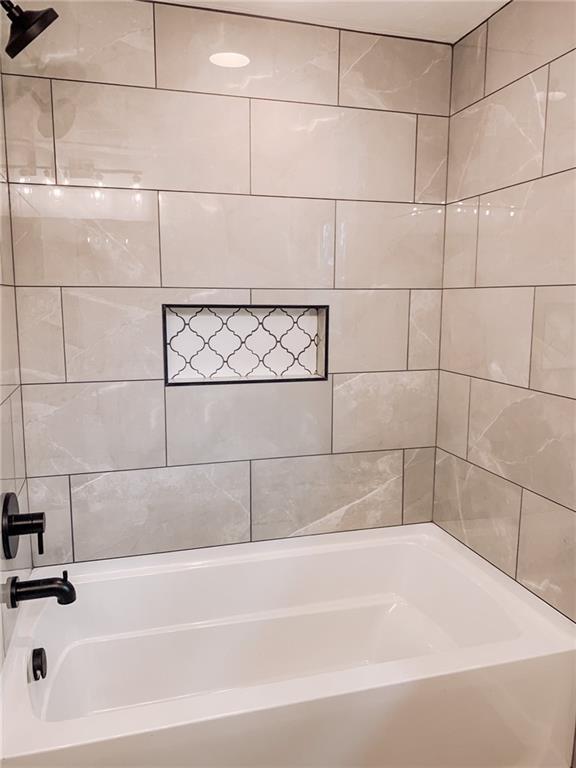 604 New Texas Road Pittsburgh, PA 15239 - Photo 9 of 18 a bathroom with a bathtub