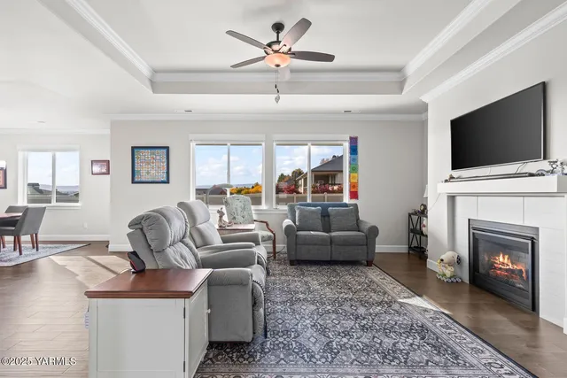 a living room with furniture and a rug